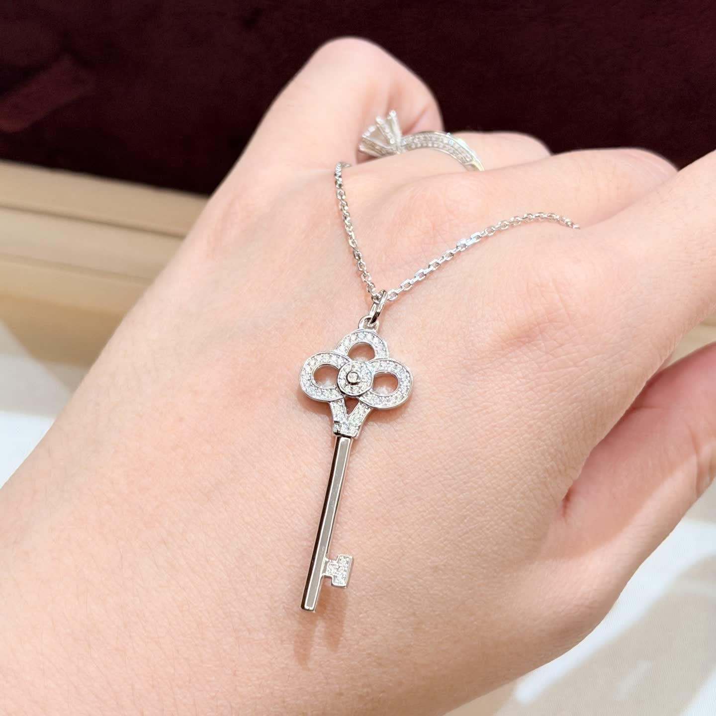 Tiffany & Co Silver Key Pendant with Diamonds